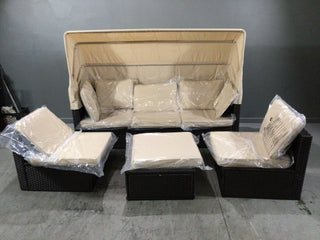 Four piece outdoor sofa with canopy
