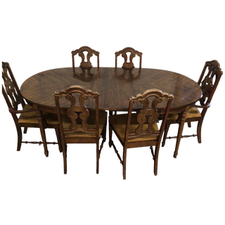 Brown Oval Dining Table With Six Chairs