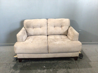 Tan Colored Loveseat